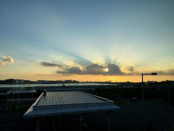 View of cityscape against sky during sunset