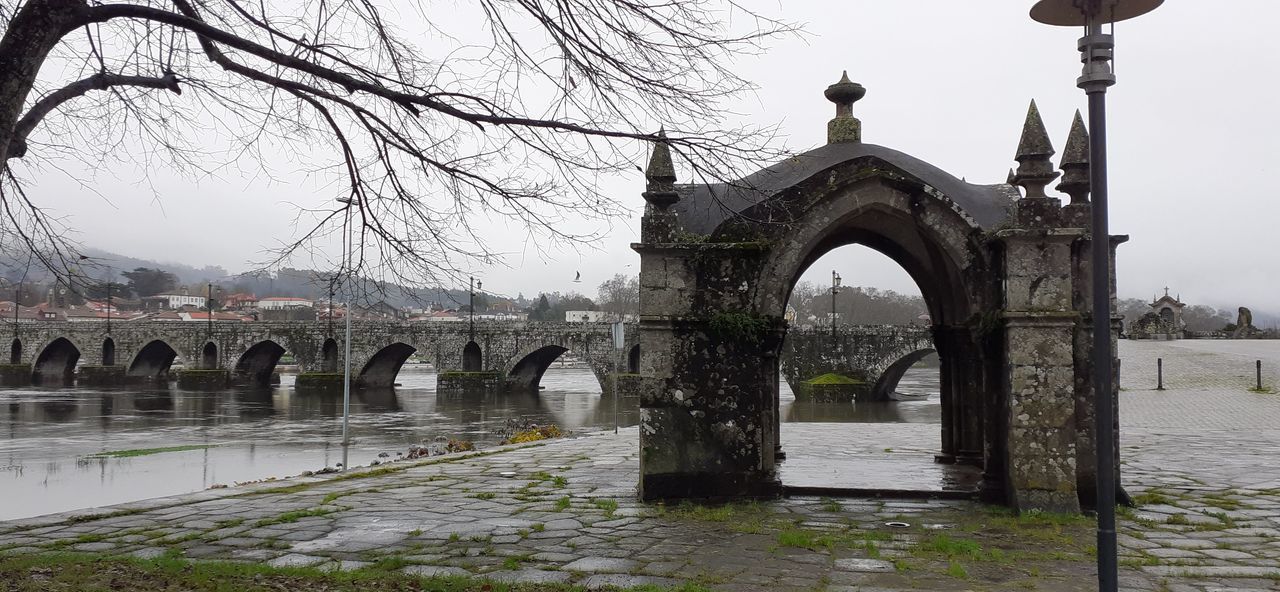 ARCH BRIDGE OVER RIVER