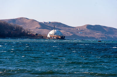 Scenic view of sea against clear sky