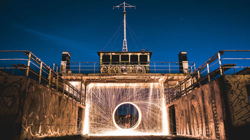 Man standing by wire wool 