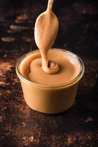 High angle view of sauce in bowl on table