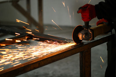 Illuminated machine part in factory