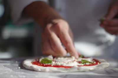 Chef making pizza