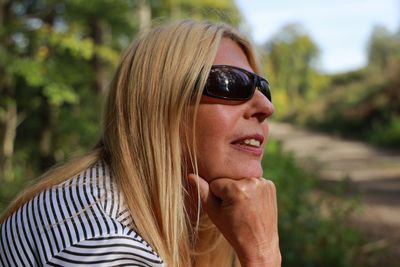 Portrait of woman wearing sunglasses