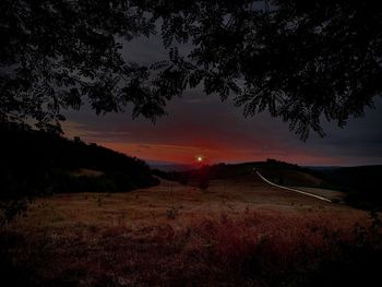 Scenic view of landscape against sky during sunset