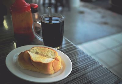 Close-up of breakfast served on table