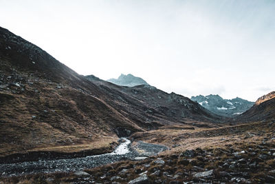 Scenic view of mountains against clear sky