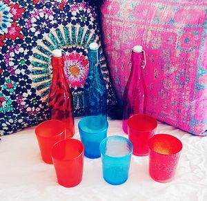 High angle view of multi colored umbrellas on table