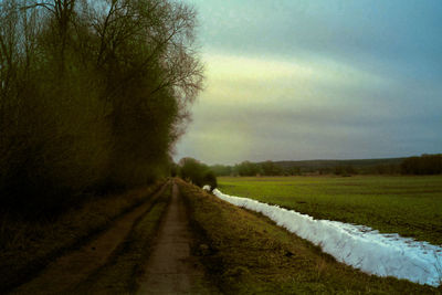 Road passing through rural landscape