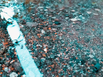 High angle view of stones on street