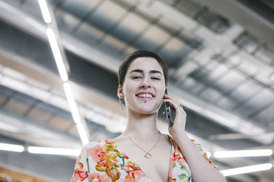 Portrait of smiling young woman