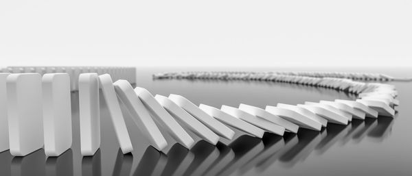 Close-up of piano against white background