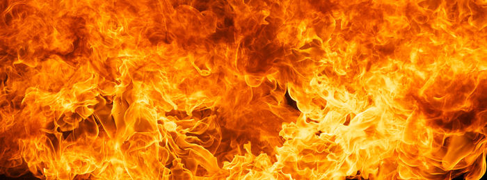 Close-up of fire against black background