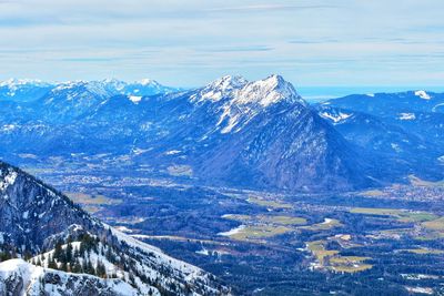 Scenic view of snowcapped mountains against sky