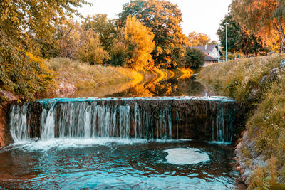 Scenic view of waterfall during autumn