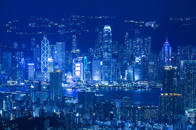 Aerial view of illuminated city at night