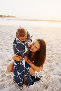 Mother and son on beach