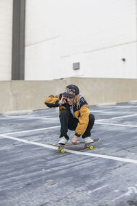 Young man skateboarding.