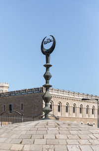 Low angle view of building against blue sky