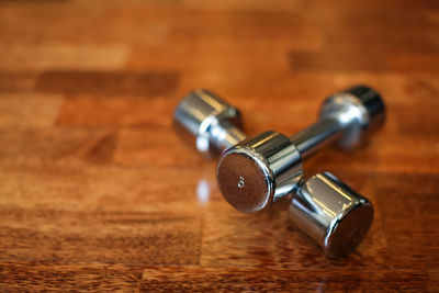 High angle view of dumbbell on floor