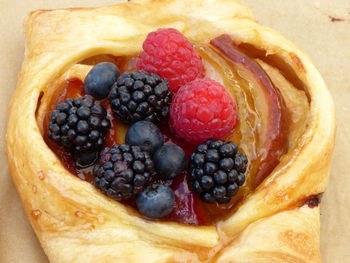 Pastry topped with fresh berries