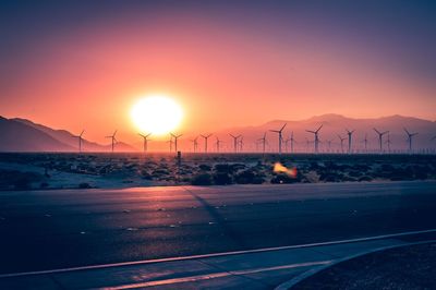 Scenic view of sunset over land