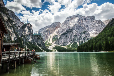 Scenic view of lake and mountains against sky