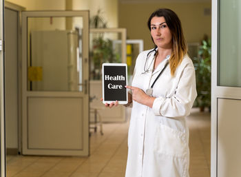 Woman standing in front of door