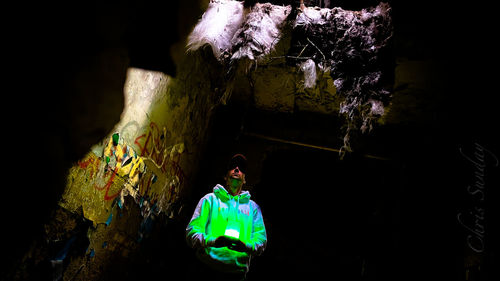 Rear view of man and woman in building