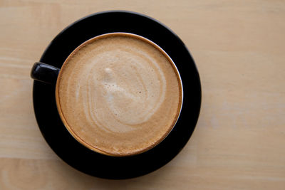 High angle view of coffee on table