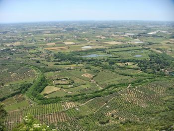 Aerial view of agricultural field against sky