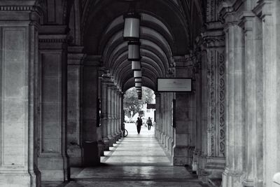 Rear view of man in corridor