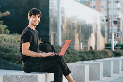 Young man using mobile phone