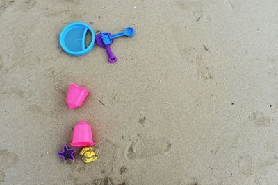 High angle view of stuffed toy on sand