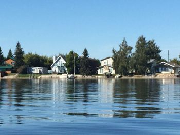 View of calm lake against clear sky