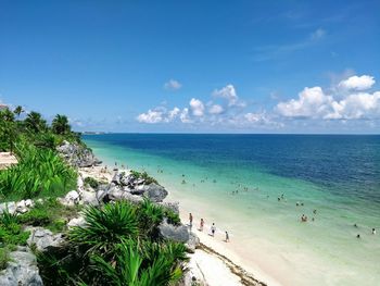 High angle view of people on beach against sky