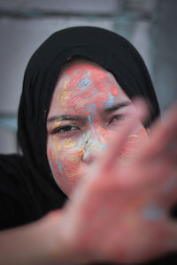 Close-up portrait of young woman