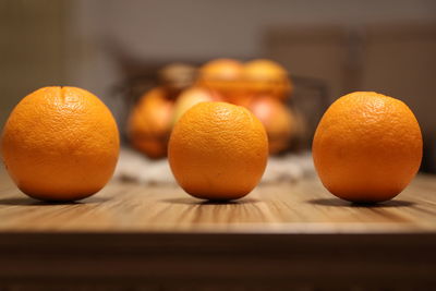 Close-up of oranges on table