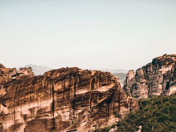 Rock formations on mountain against sky