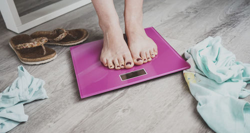 High angle view of person standing on table