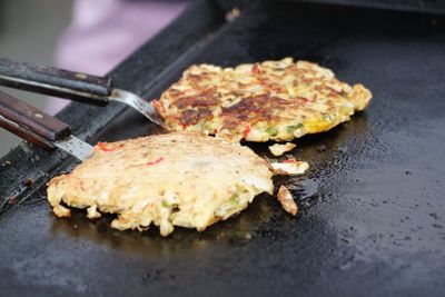 Close-up of meat on barbecue grill