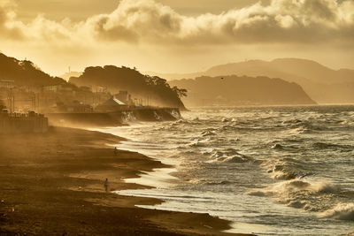 Scenic view of sea against sky during sunrise 