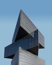 Low angle view of modern building against clear sky