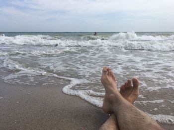 Low section of person on beach