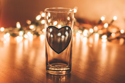 Close-up of wine glass on table