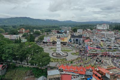 High angle view of townscape bukittinggi  against sky in west sumatra
