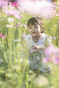 Portrait of child on field