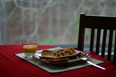 Close-up of food and drink served on table