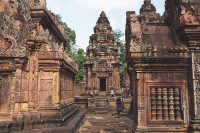 Exterior of old ruined temples against sky