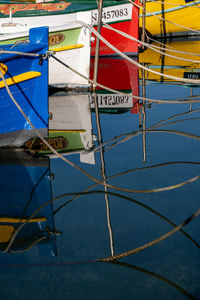 Fishing boat moored at harbor